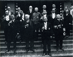 Prime Minister SAITO Minoru and cabinet ministers making a toast in the inner courtyard of the Prime Minister's Residence before the first cabinet meeting From (Showa  Niman'nichi no Zen Kiroku. Vol.3)
